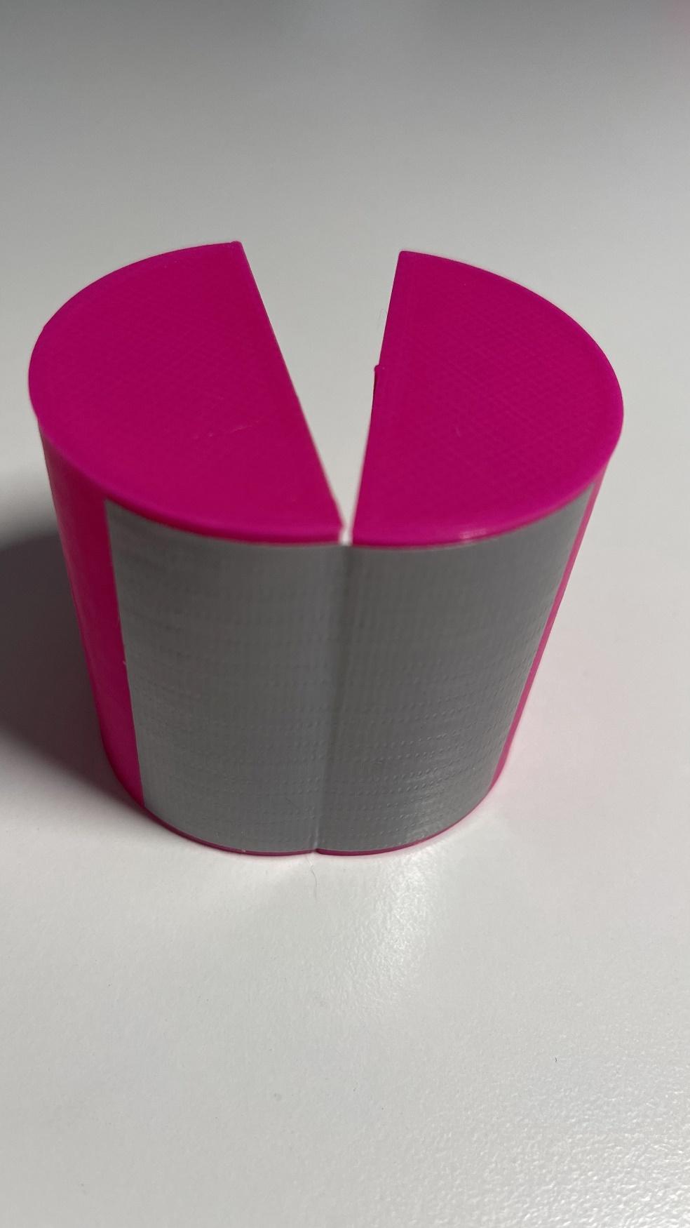 A cylinder made of two halves joined with a piece of adhesive tape (Tesa extra Power)as a hinge.